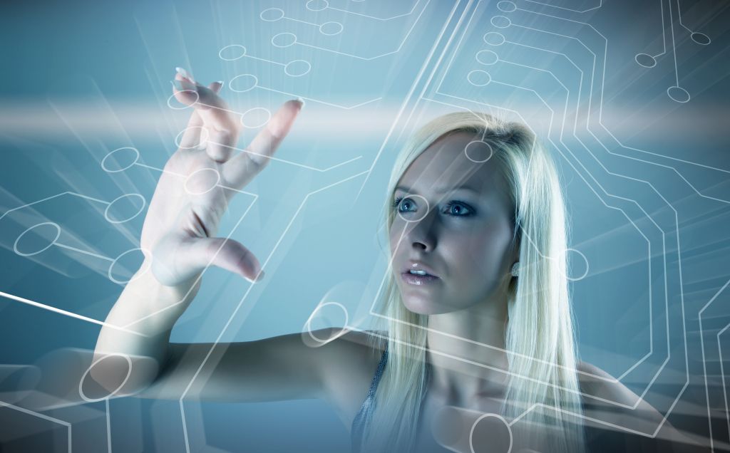 Sexy blonde using futuristic transparent computer interface
